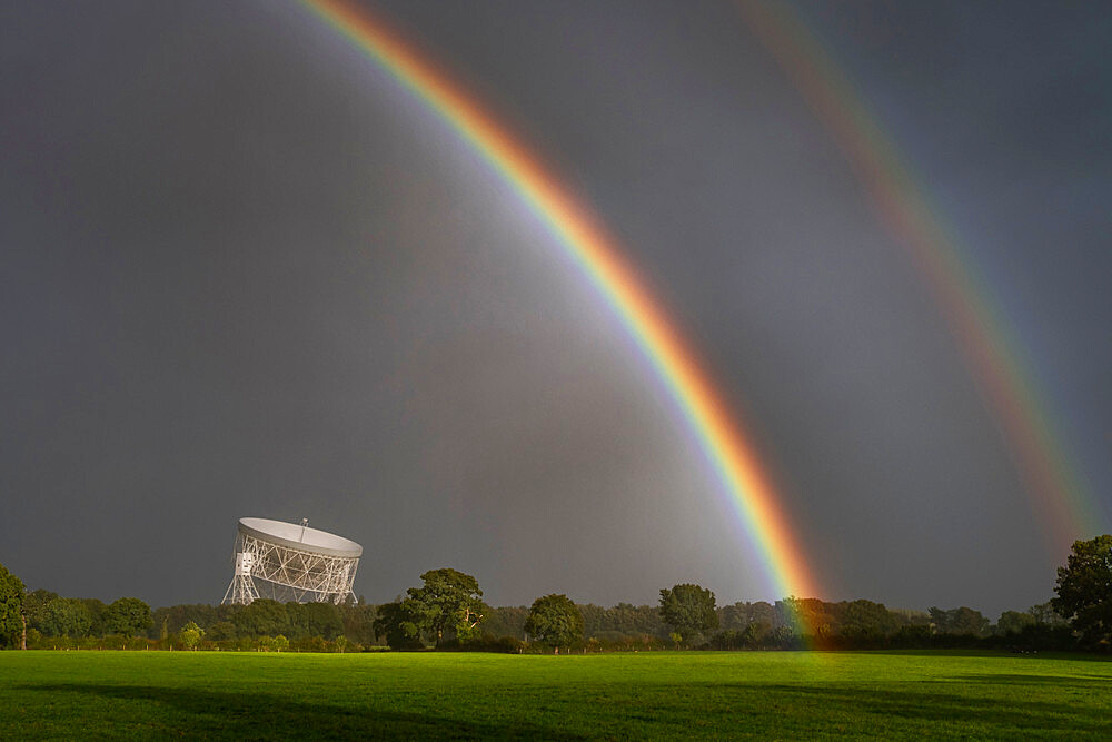 Double rainbow arching over the Jodrell Bank Lovell Radio Telescope, near Goostrey, Cheshire, England, United Kingdom, Europe