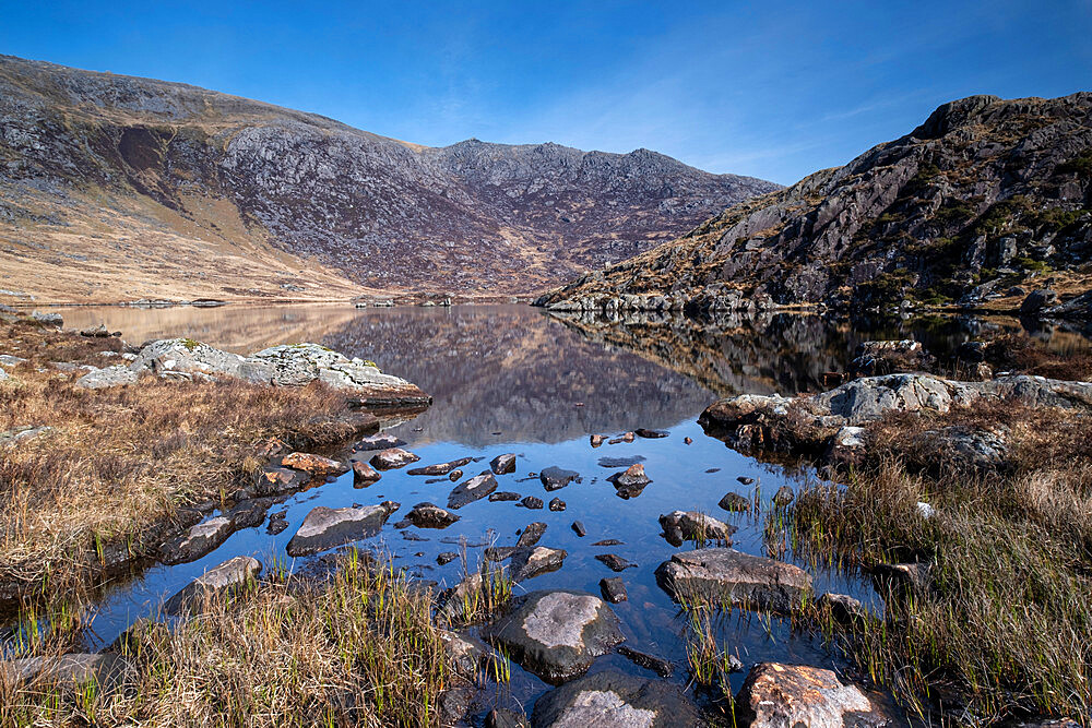 Llyn Cwmffynnon and distant Glyder Fach, The Glyderau, Snowdonia National Park, North Wales, United Kingdom, Europe