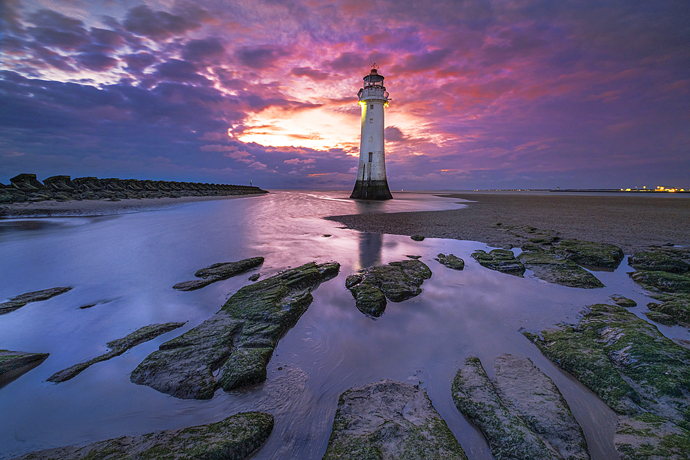 Perch Rock Lighthouse on New Brighton Sands at sunset, New Brighton, The Wirral, Merseyside, England, United Kingdom, Europe