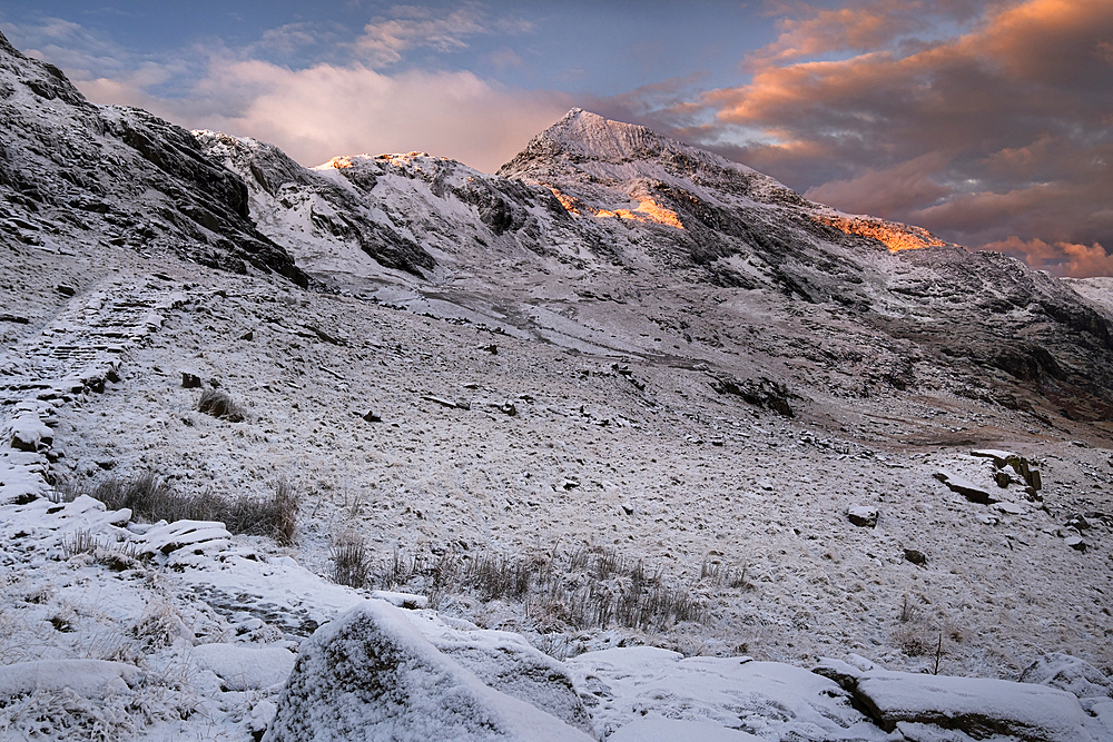 First Light on Crib Goch from the PYG Track in winter, near Pen y pass, Snowdonia National Park, Eryri, North Wales, United Kingdom, Europe