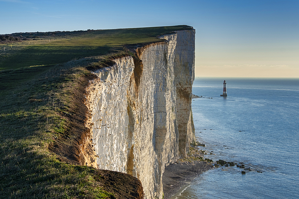 Beachy Head Lighthouse and the white chalk cliffs of Beachy Head, South Downs National Park, East Sussex, England, United Kingdom, Europe