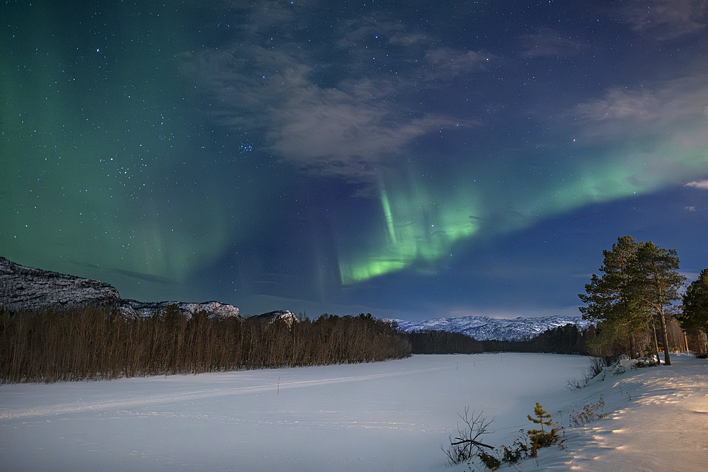 Aurora Borealis (Northern Lights) over the frozen Alta River, near Alta, Arctic Circle, Norway, Scandinavia, Europe