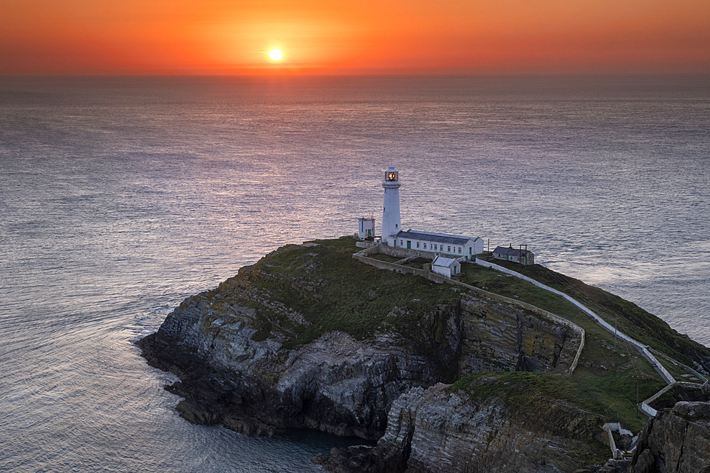 South Stack Lighthouse and the Irish Sea at sunset, Holy Island, Anglesey, North Wales, UK