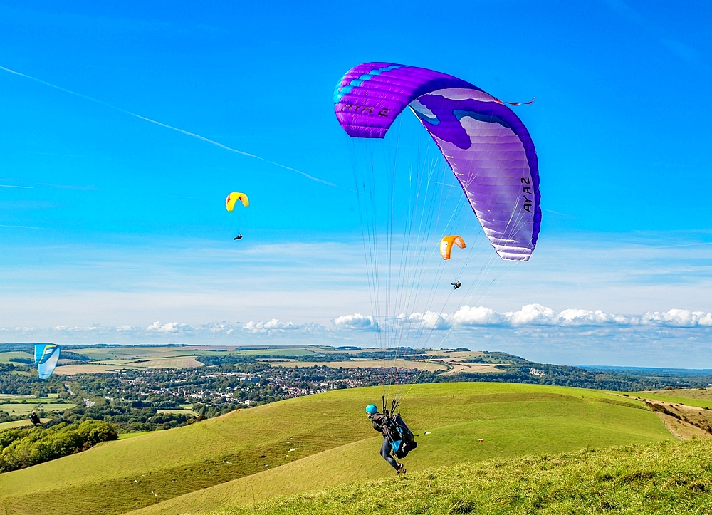 Paraglider taking off at Mount Caburn, near Lewes, East Sussex, England, United Kingdom, Europe