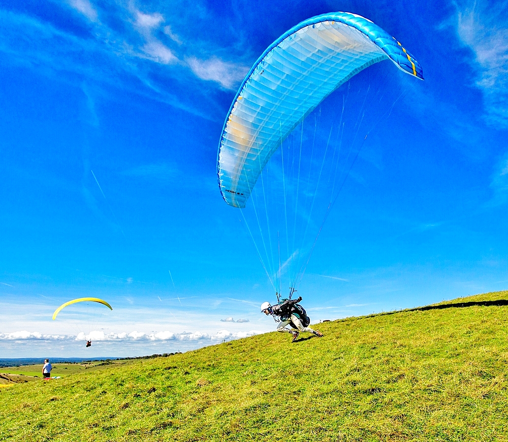 Paraglider taking off at Mount Caburn, near Lewes, East Sussex, England, United Kingdom, Europe