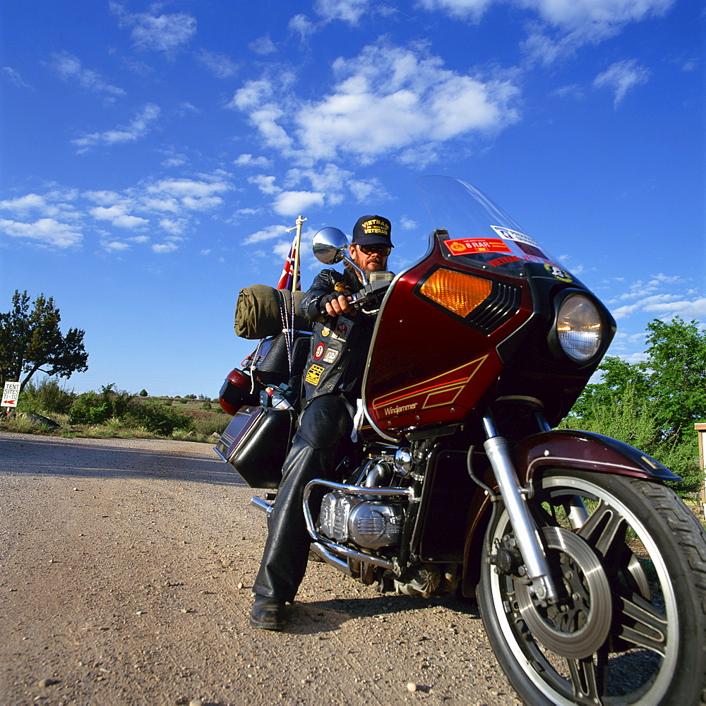 Portrait of biker on a Harley Davidson motor cycle, United States of America, North America