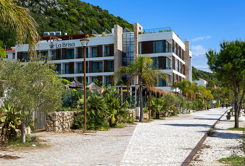 Modern architecture of La Brisa hotel building on the seafront of Dhermi Beach, Dhermi, Albania, Europe