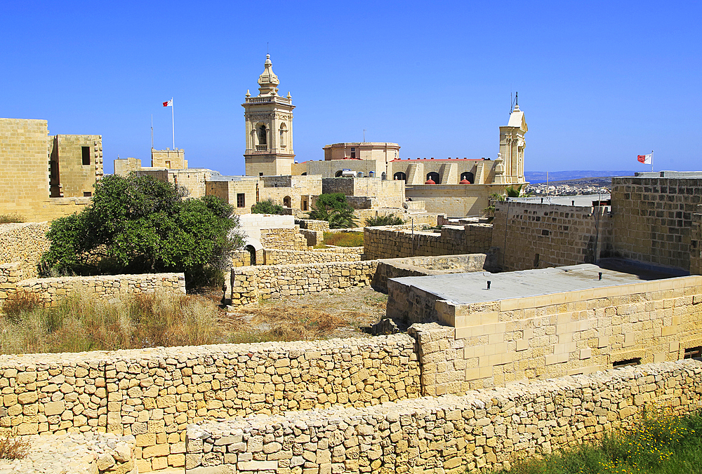 Cathedral church tower and ruins inside citadel castle walls Il-Kastell, Victoria Rabat, Gozo, Malta, Mediterranean, Europe