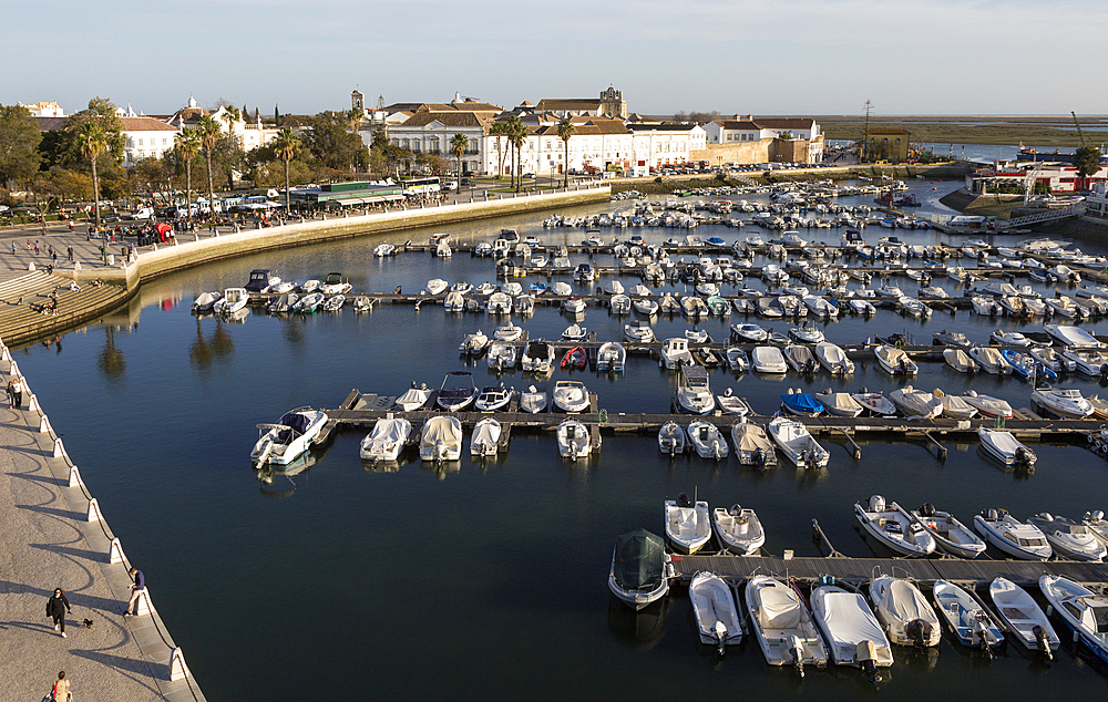 Boats at moorings in the evening inn the marina in the harbour at Faro, Algarve, Portugal, Europe