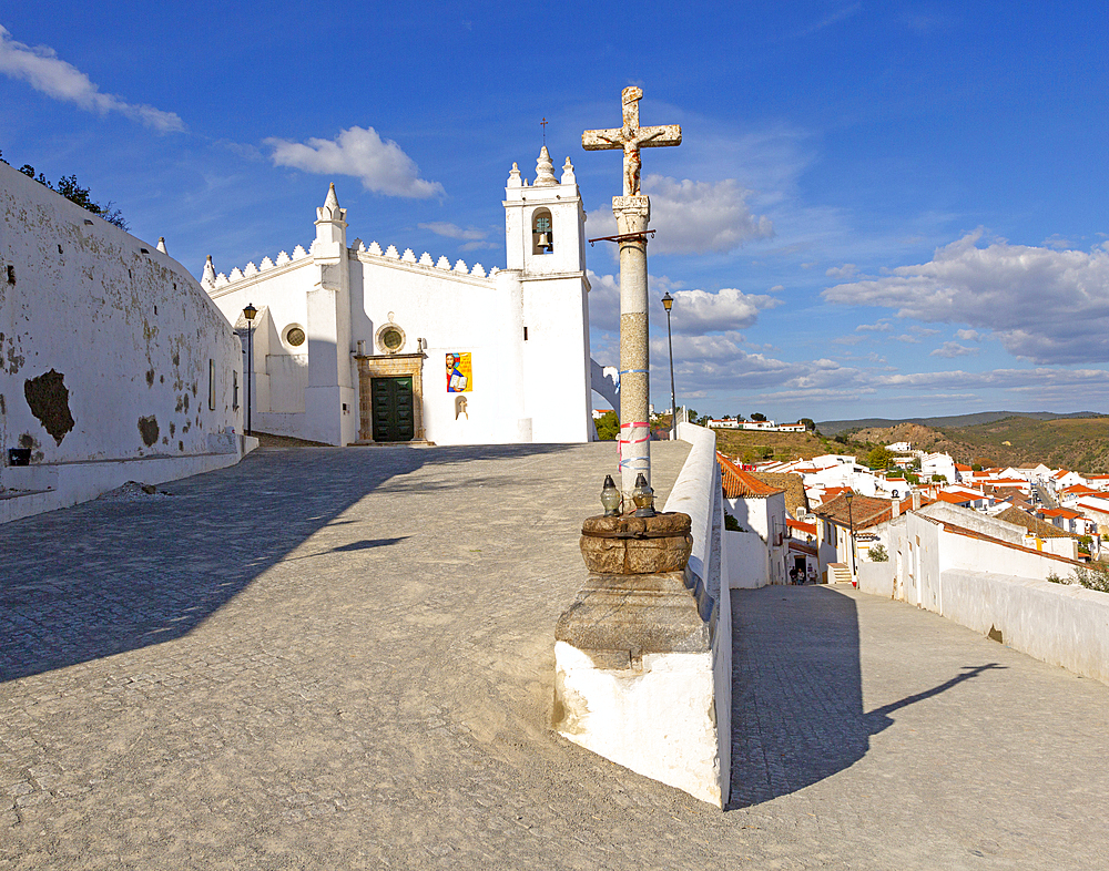 Historic whitewashed church of Igreja Matriz in medieval village of Merrtola, Baixo Alentejo, Portugal, Europe