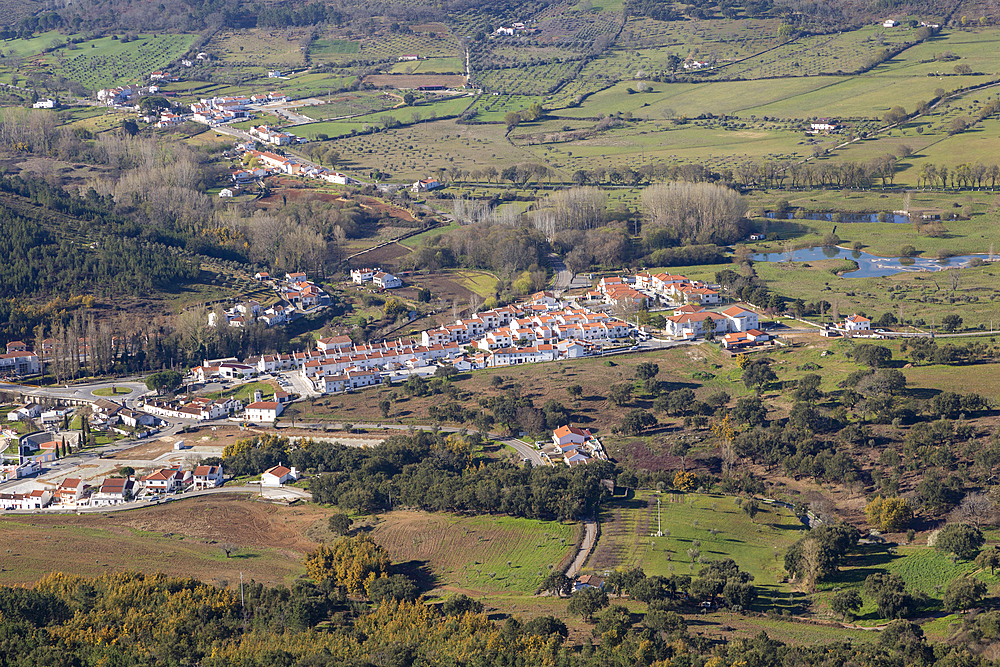 Elevated view to lowland below with village of Portages in the centre, taken from Marvao, Portalegre district, Alto Alentejo, Portugal, Europe