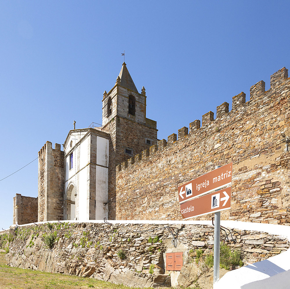 Matriz church in walls of historic ruined castle at Mourao , Alentejo Central, Evora district, Portugal, Europe