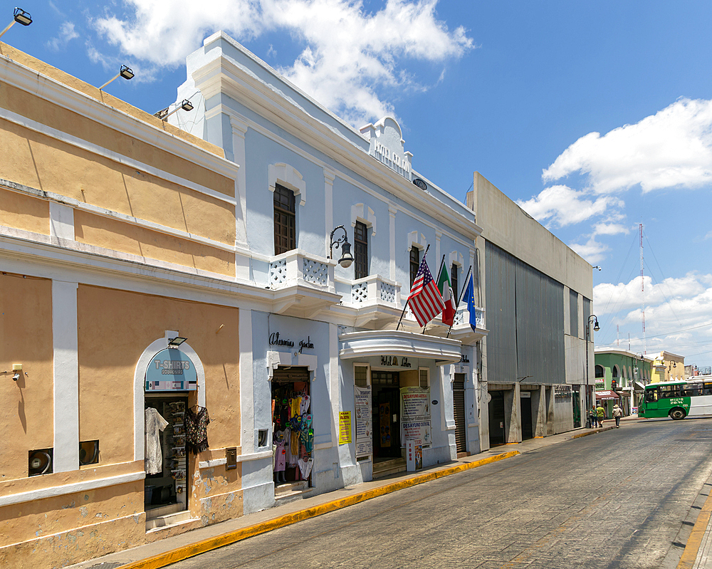 Flags flying on frontage of Hotel Colon, Merida, Yucatan State, Mexico, North America