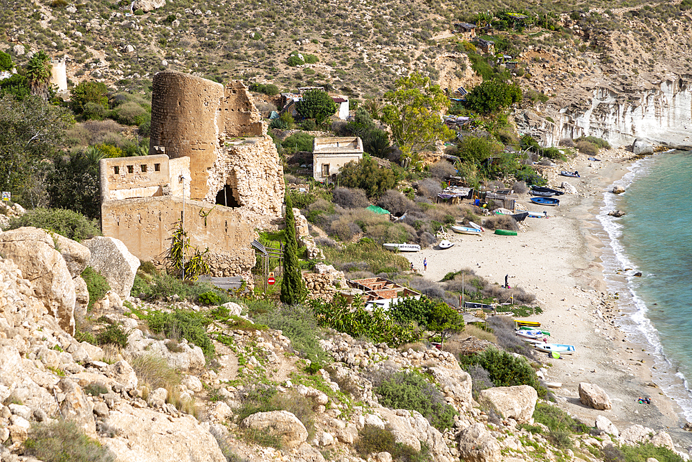 Castle, buildings and beach, Cala de San Pedro, Cabo de Gata Natural Park, Nijar, Almeria, Spain, Europe