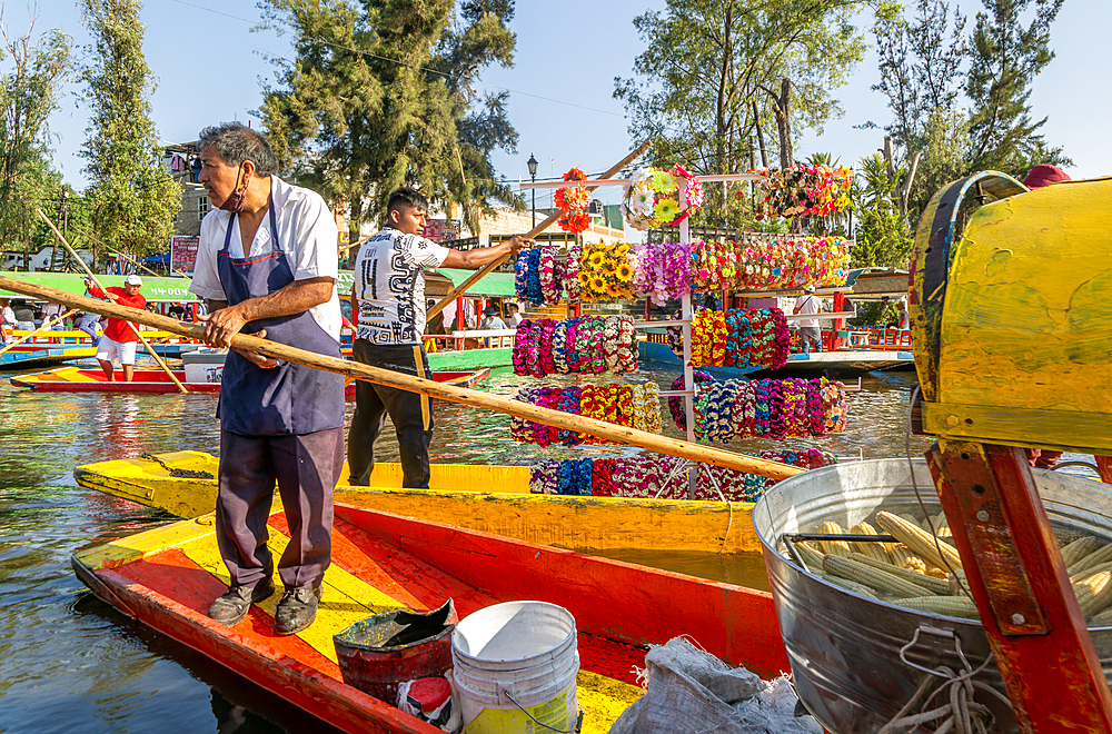 Small boat shop selling corn cobs and flowers at popular tourist attraction, boating, Xochimiloco, Mexico City, Mexico, North America