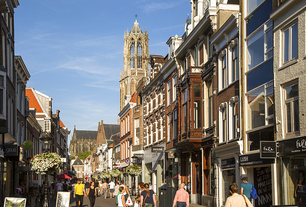 Historic buildings and famous fourteenth century Dom church tower in city of Utrecht, Netherlands