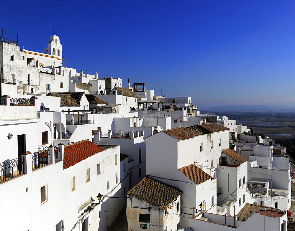 Pueblo blanco historic village whitewashed houses on hillside, Vejer de la Frontera, Cadiz Province, Spain