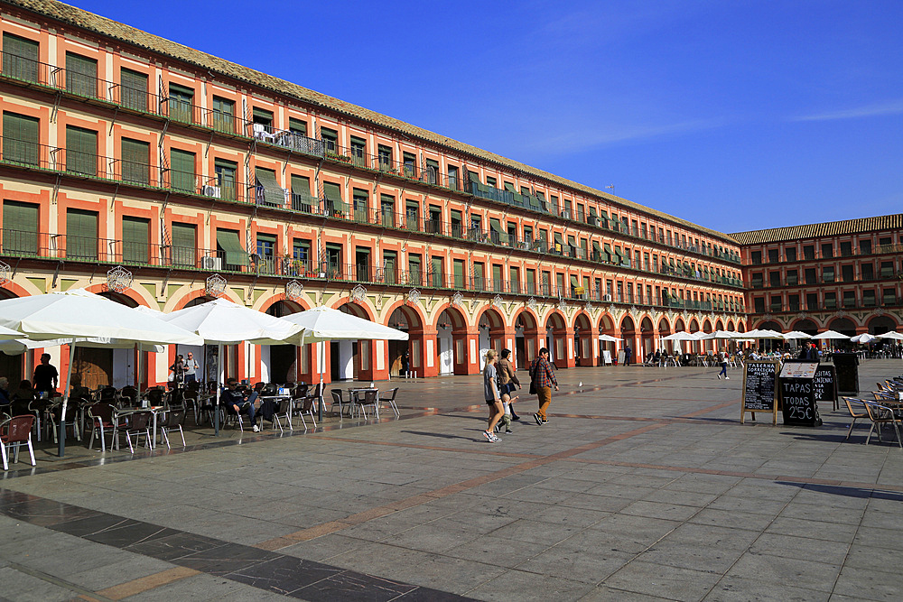 Historic buildings in Plaza de Corredera seventeenth century colonnaded square, Cordoba, Spain