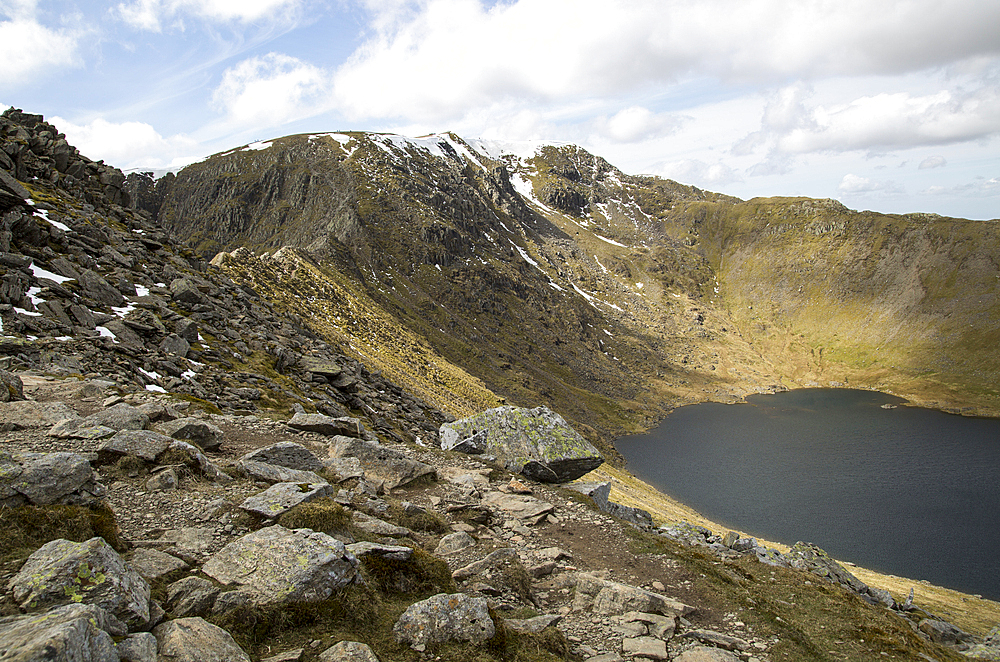 Striding Edge arete Helvellyn mountain peak and Red Tarn corrie lake, Lake District, Cumbria, England, UK