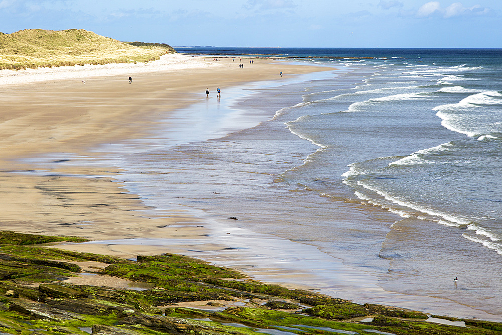 Wide sandy beach at Seahouses, Northumberland, England,UK