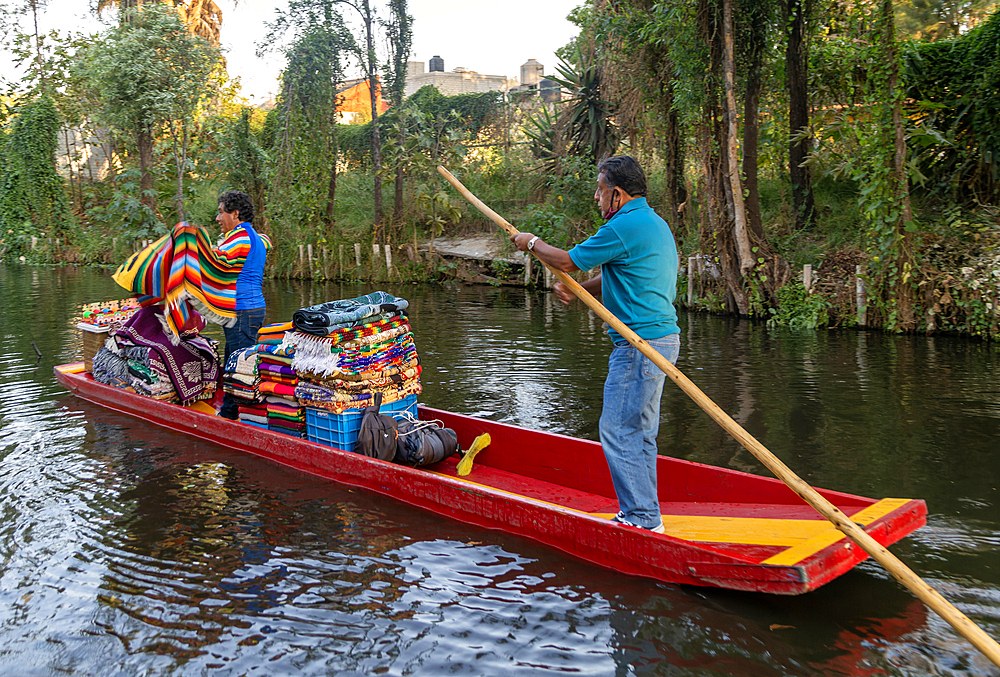 Boat selling blankets at popular tourist attraction, Xochimiloco, Mexico City, Mexico, North America