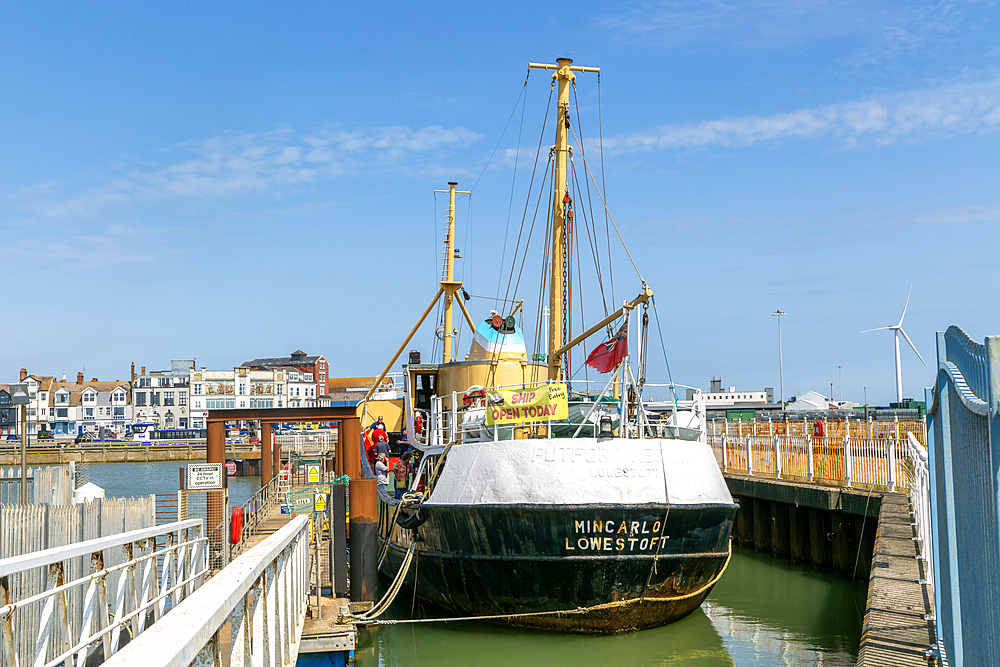 Historic fishing boat trawler museum Mincarlo in harbour at Heritage Quay, Lowestoft, Suffolk, England, UK