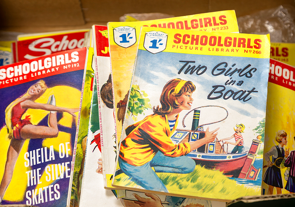 Vintage Schoolgirls Picture Library cartoon comic books on display at auction, UK