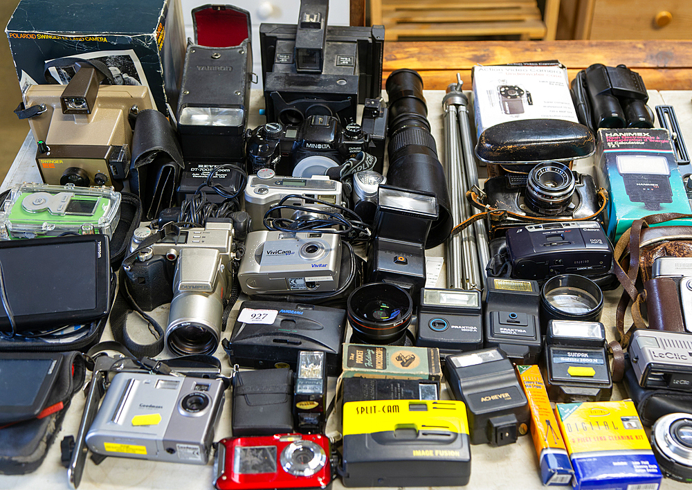 Display of old secondhand cameras and photographic equipment on display at auction, Campsea Ashe, Suffolk, England, UK