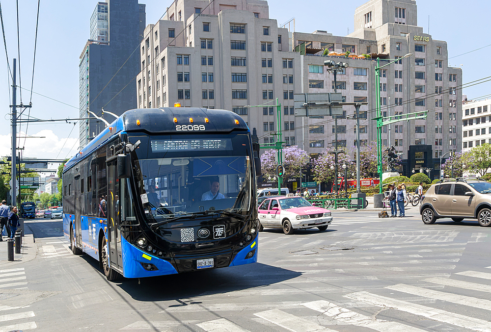 Electric powered modern trolley bus public transport rapid transit system, Centro Historico, Mexico City, Mexico, North America