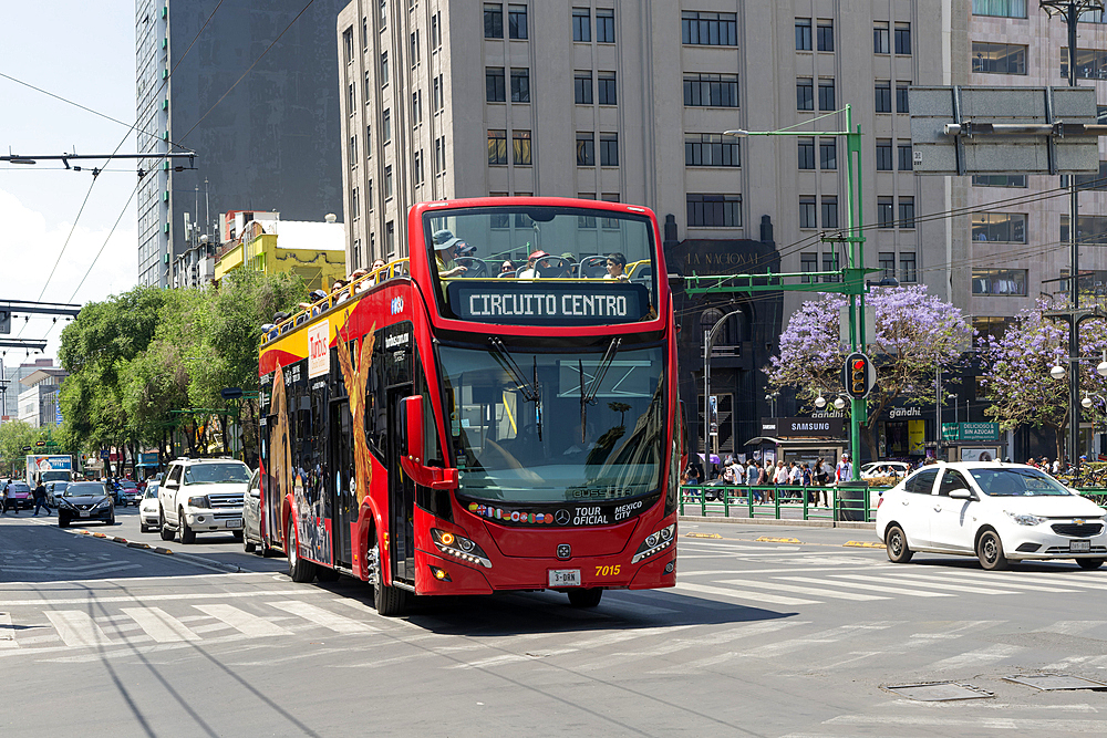 Red open top double decker tourist bus Circuit Centro tour, Eje Central or Avenida Lazaro Cardenas street, Centro Historico City, Mexico City, Mexico, North America