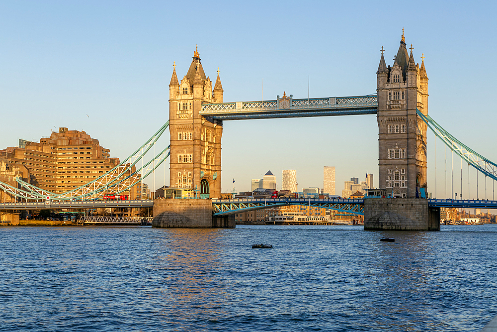 Tower Bridge in sunshine at dusk, River Thames from Southwark, London, England, UK