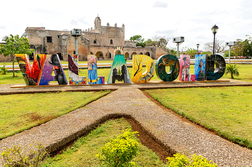 Colourful lettering sign for Vallodolid, in front of Convent of San Bernardino of Siena, Vallodolid, Yucatan, Mexico, North America