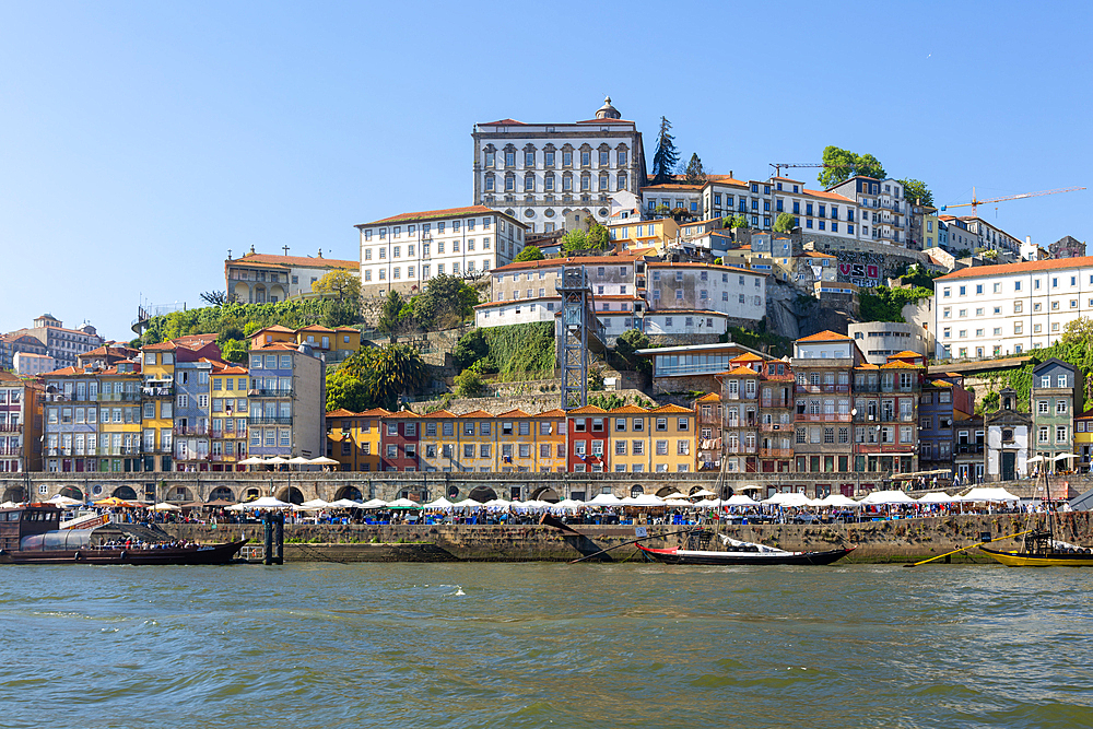 Historic riverside buildings on hillside of Ribeira next to River Douro, Porto, Portugal, Europe view to cathedral