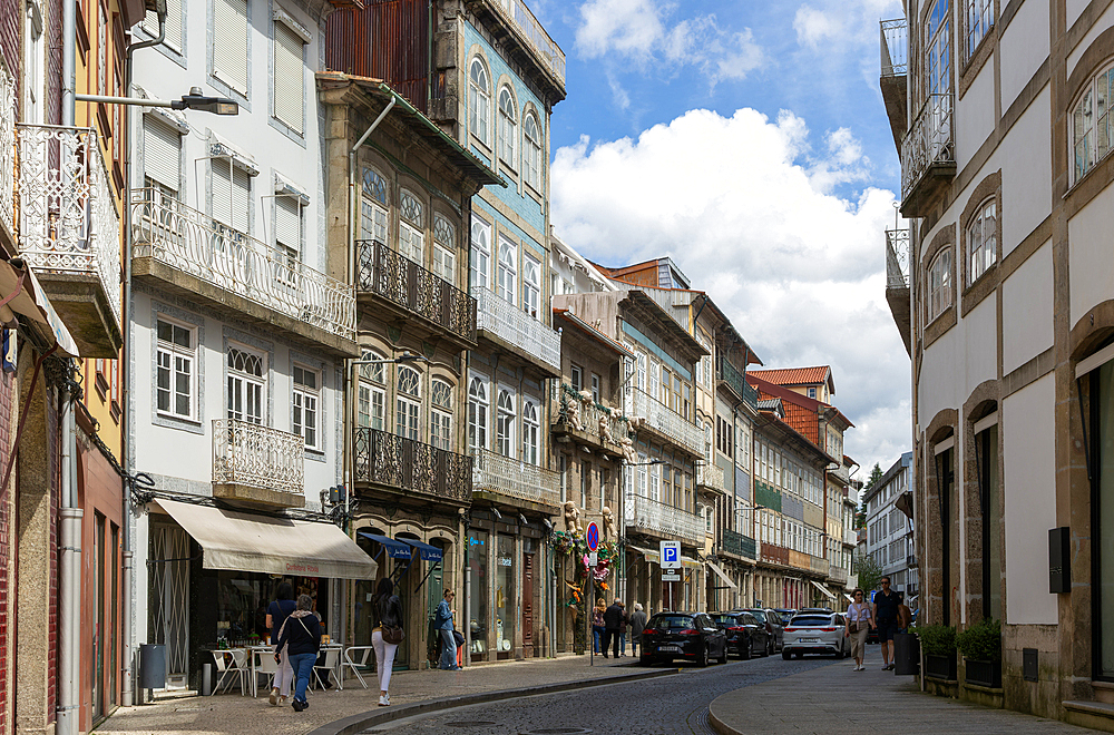 Shops in historic buildings, Rua de Santa Antonio, city centre Guimaraes, northern Portugal, Europe