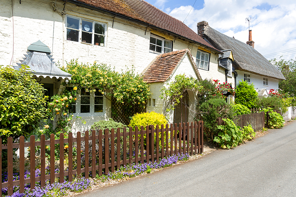 Attractive historic cottages in village of Avebury, Wiltshire, England, UK