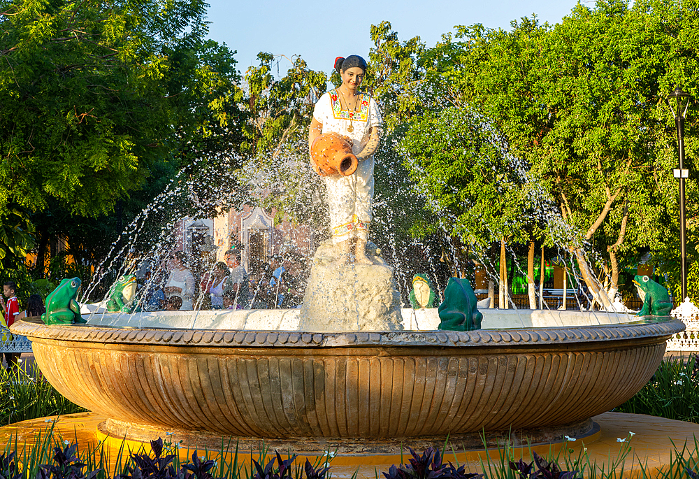 Female Mayan figure woman holding water jug in fountain, Francisco Canton Rosado Park, Valladolid, Yucatan, Mexico, North America