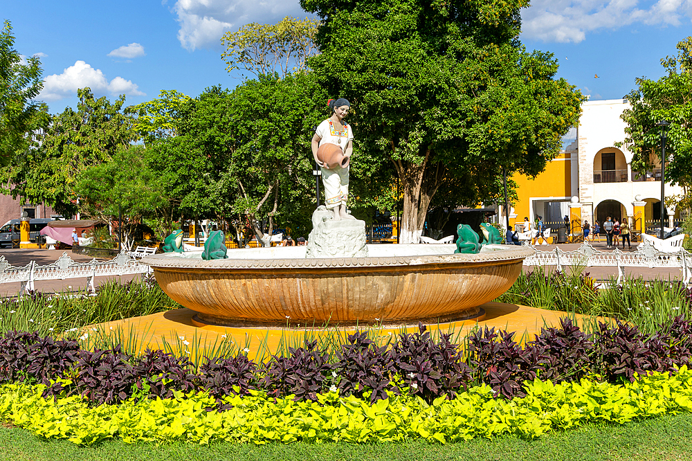 Female Mayan figure woman holding water jug in fountain, Francisco Cantón Rosado Park, Valladolid, Yucatan, Mexico, North America