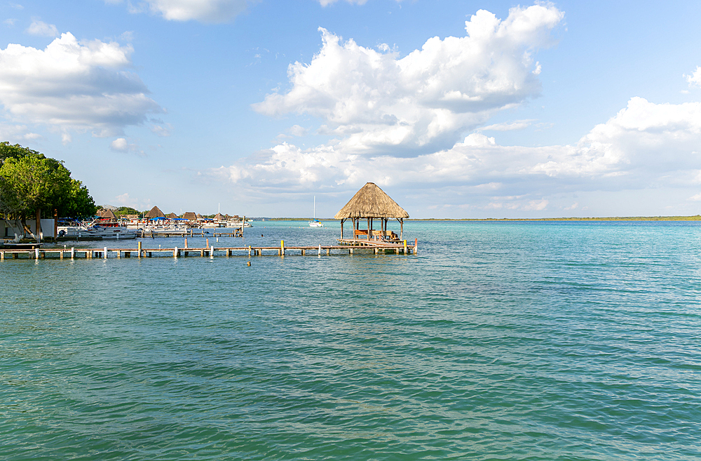 Cabana thatched cabin on wooden jetty Lake Bacalar, Bacalar, Quintana Roo, Yucatan Peninsula, Mexico, North America