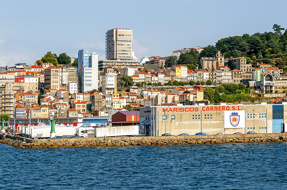 Mariscos Carnero fish farming seafood processing buildings on quayside of port, city of Vigo, Galicia, Spain, Europe