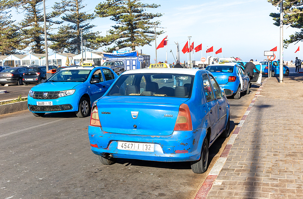 Blue Dacia Logan cars used as small local taxis (petits taxi), Essaouira, Morocco, North Africa, Africa