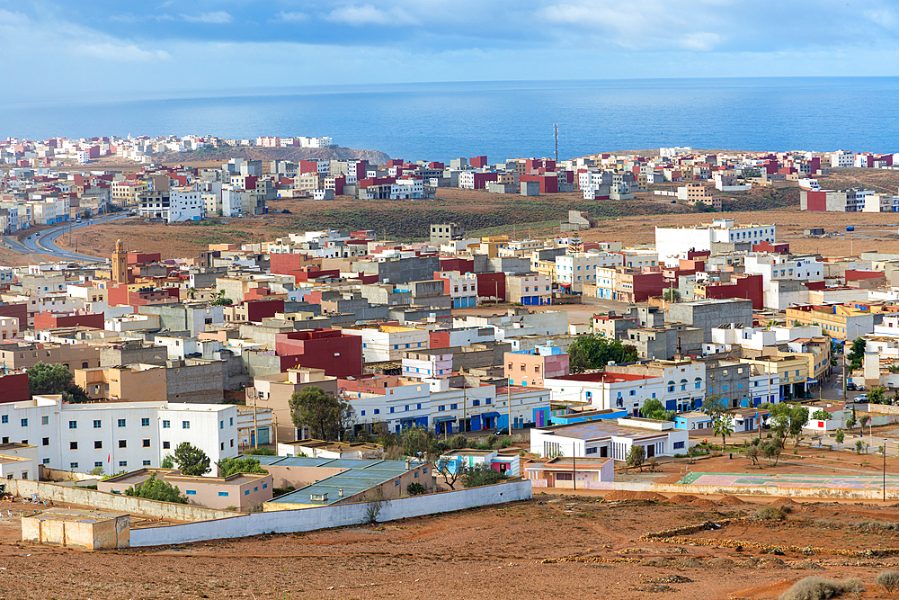 Oblique view over coastal town to Atlantic Ocean, Mirleft, southern Morocco, North Africa, Africa