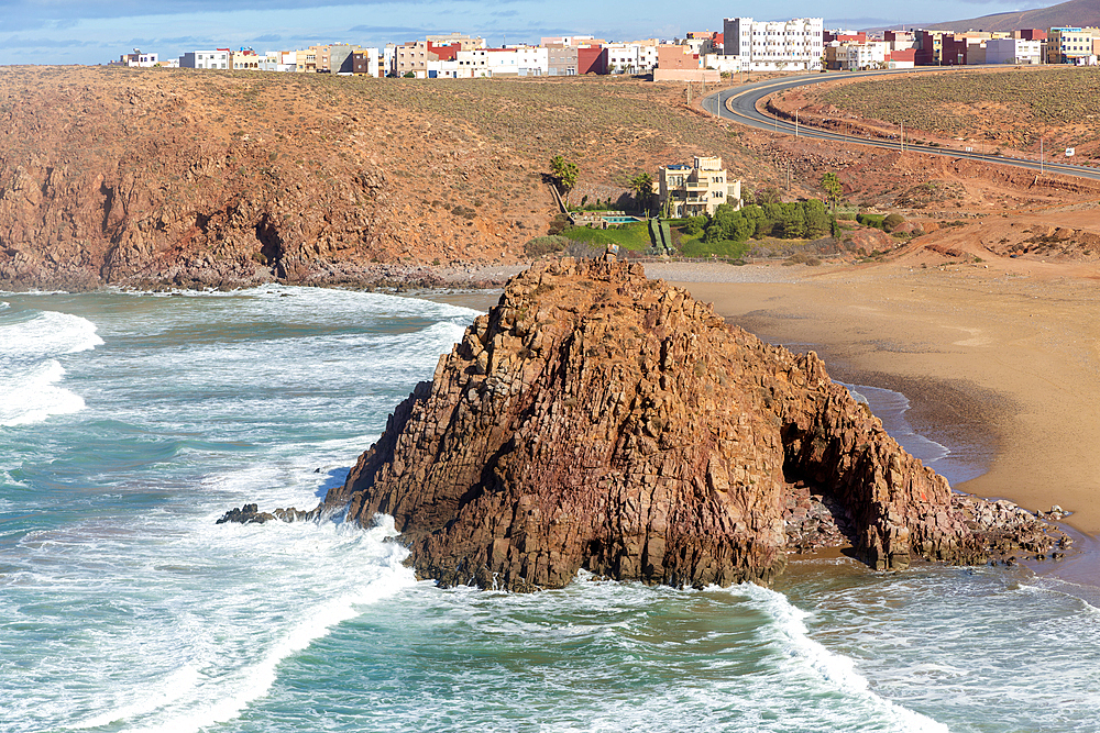 Beach with rocky outcrop on coastline in bay, Plage Sidi Mohammed Ben Abdellah, Mirleft, Morocco, North Africa, Africa