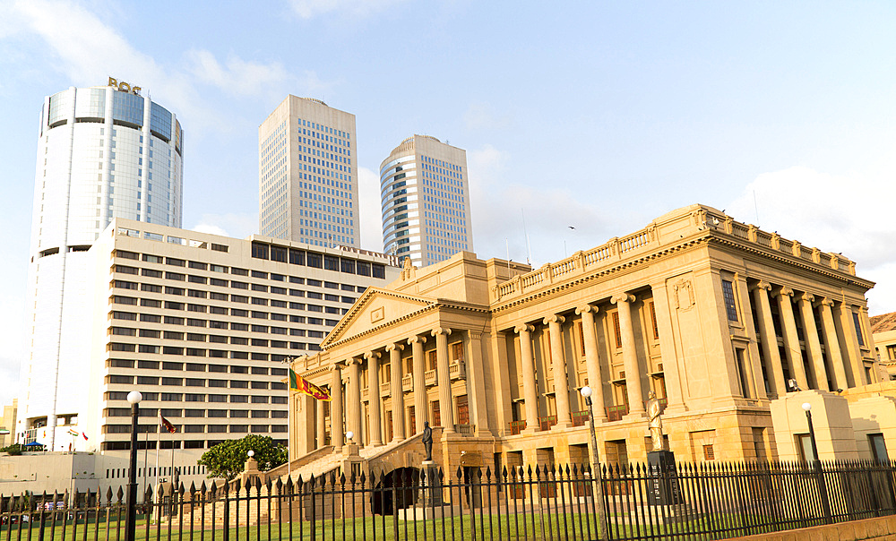 Old Parliament Building now the Presidential Secretariat offices and modern skyscrapers, Colombo, Sri Lanka, Asia