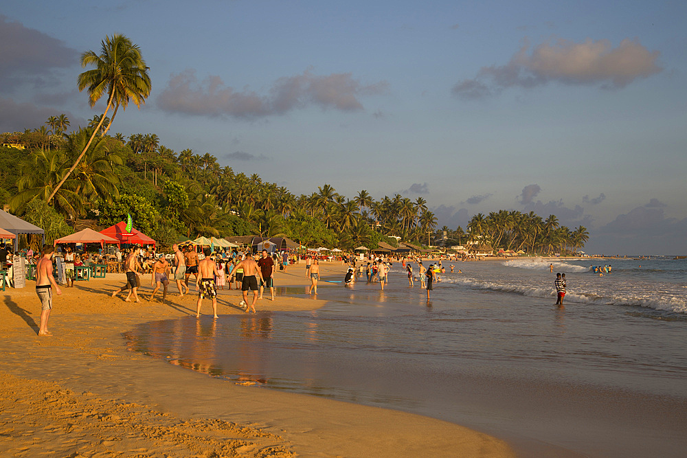 Crowded sandy beach at Mirissa, Sri Lanka, Asia