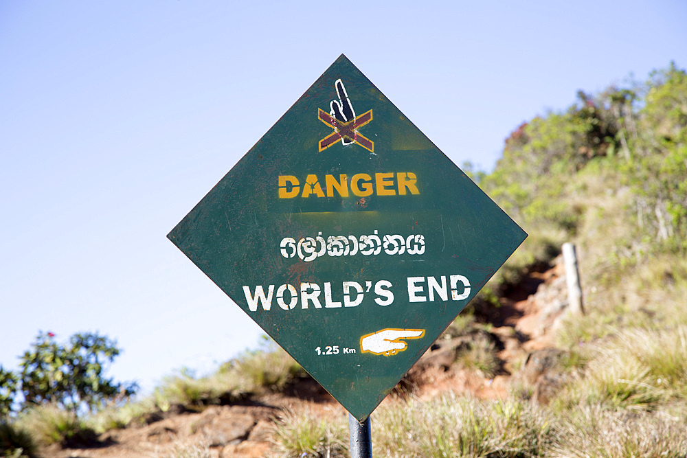 Sign warning of danger at World's End cliff at Horton Plains National Park, Sri Lanka, Asia