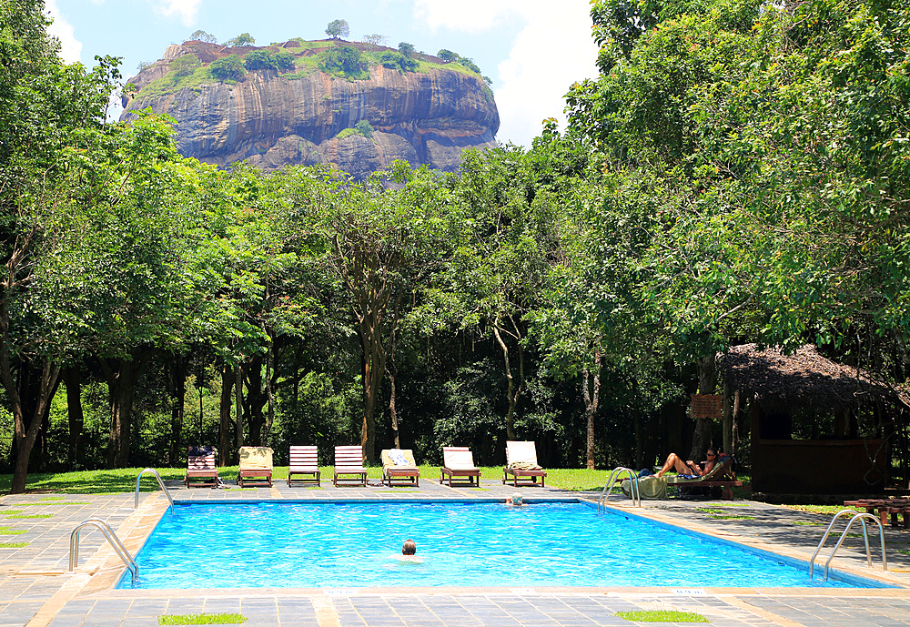 Swimming pool view to Rock Palace at Hotel Sigiriya, Sigiriya, Central Province, Sri Lanka, Asia