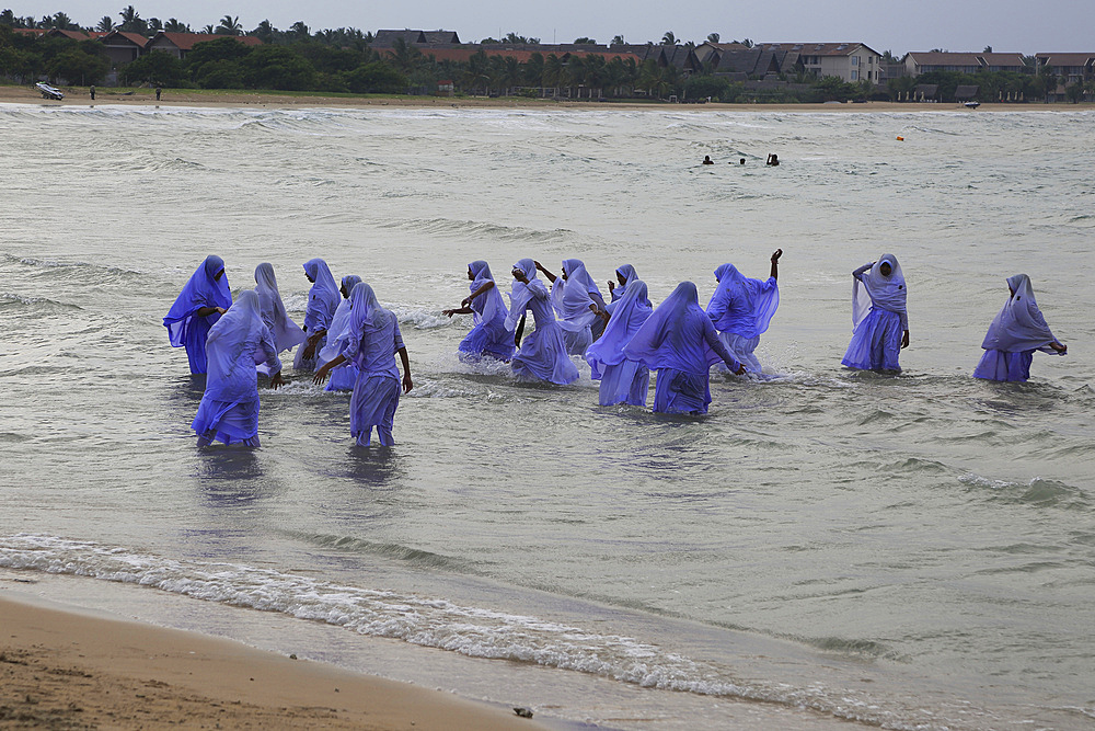 Muslim girls bathing in their clothes, Pasikudah Bay, Eastern Province, Sri Lanka, Asia