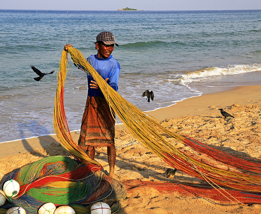 Traditional fishing hauling nets, Nilavelli beach, near Trincomalee, Eastern province, Sri Lanka, Asia