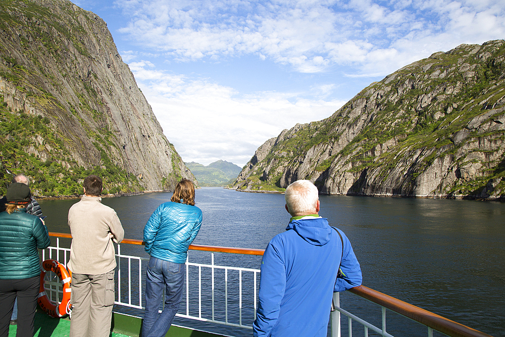 Tourists sightseeing from Hurtugruten ship, Trollfjorden, Lofoten Islands, Nordland, northern, Norway, Scandinavia, Europe