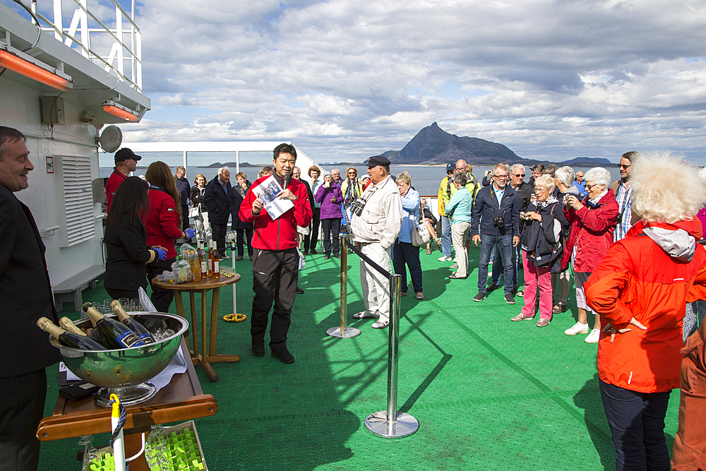 Celebration crossing the Arctic Circle heading south, on Hurtigruten ferry, Norway, Scandinavia, Europe